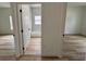 Hallway view of bedrooms and bathroom at 14759 Sw 43Rd Terrace Rd, Ocala, FL 34473