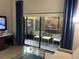 Relaxing balcony space with comfortable seating and lovely courtyard views at 14501 Grove Resort Ave # 1105, Winter Garden, FL 34787