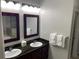 Double vanity bathroom with granite countertop at 14501 Grove Resort Ave # 1105, Winter Garden, FL 34787