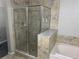 Large walk-in shower with tile surround at 14501 Grove Resort Ave # 1105, Winter Garden, FL 34787