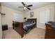 Bedroom with a double bed, dresser, and ceiling fan at 1658 Lake Side Ave, Davenport, FL 33837