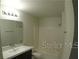 Updated condo bathroom with bathtub and modern vanity at 5479 Vineland Rd # 9201, Orlando, FL 32811