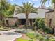 Front entrance of home with unique stone and wood accents at 208 Green Lake Cir, Longwood, FL 32779