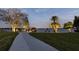 Well lit driveway leading to waterfront home at 208 Green Lake Cir, Longwood, FL 32779