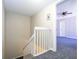 White railing staircase leading to upper level at 2920 Pecan Ave, Leesburg, FL 34748