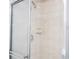 Shower stall with tiled walls and glass door at 2920 Pecan Ave, Leesburg, FL 34748