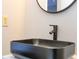 Modern black vessel sink in a bathroom at 2920 Pecan Ave, Leesburg, FL 34748
