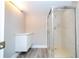 Modern bathroom with a floating vanity and a walk-in shower at 2920 Pecan Ave, Leesburg, FL 34748