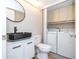 Updated bathroom with washer and dryer in the same room at 2920 Pecan Ave, Leesburg, FL 34748
