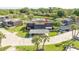 Aerial view highlighting the property's location near a pond at 2920 Pecan Ave, Leesburg, FL 34748