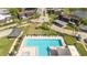 Community pool with lounge chairs and spa at 2920 Pecan Ave, Leesburg, FL 34748