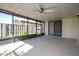 Spacious screened patio with ceiling fan at 2920 Pecan Ave, Leesburg, FL 34748
