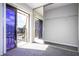 Bedroom with mirrored closet and access to balcony at 2920 Pecan Ave, Leesburg, FL 34748