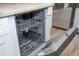 Stainless steel built-in dishwasher with open door at 2920 Pecan Ave, Leesburg, FL 34748
