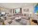 Spacious living area with sectional sofa and pool view at 4289 Lana Ave, Davenport, FL 33897