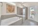 Bathroom boasts garden tub, walk-in shower, and private pool access at 4289 Lana Ave, Davenport, FL 33897