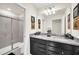 Modern bathroom with double vanity and walk-in shower at 4289 Lana Ave, Davenport, FL 33897