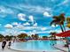 Large resort-style pool with plenty of lounge chairs at 4289 Lana Ave, Davenport, FL 33897