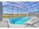 Relaxing screened-in pool with spa and patio at 4289 Lana Ave, Davenport, FL 33897