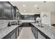 Modern kitchen with stainless steel appliances and large island at 4289 Lana Ave, Davenport, FL 33897
