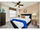 Bedroom with a king-size bed and ceiling fan at 4289 Lana Ave, Davenport, FL 33897