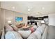 Open living room with sectional sofa and kitchen view at 4289 Lana Ave, Davenport, FL 33897