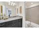 Bathroom with single vanity, granite countertop and shower/tub combo at 4289 Lana Ave, Davenport, FL 33897