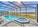 Enjoy this refreshing pool and spa with a view of the community at 4289 Lana Ave, Davenport, FL 33897