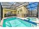 Enclosed pool and spa with plenty of space for relaxation at 2774 Bookmark Dr, Kissimmee, FL 34746