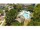 Aerial view of community pool and surrounding buildings at 2208 San Vittorino Cir # 101, Kissimmee, FL 34741