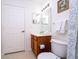 Clean bathroom with toilet, vanity, and shower/tub combo at 2208 San Vittorino Cir # 101, Kissimmee, FL 34741