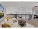Spacious loft area with plush seating and large windows at 5692 Camilla St, St Cloud, FL 34771