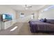 Spacious main bedroom with a king-size bed and TV at 5692 Camilla St, Saint Cloud, FL 34771