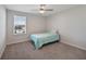 Small bedroom with a twin-sized bed and ceiling fan at 5692 Camilla St, St Cloud, FL 34771