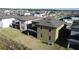 Aerial view of a two-story house with a covered patio and large backyard at 5692 Camilla St, St Cloud, FL 34771