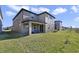 Two-story house with backyard and patio at 5692 Camilla St, St Cloud, FL 34771