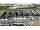 Aerial view of houses and street at 5692 Camilla St, St Cloud, FL 34771
