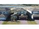 Two story house exterior with landscaping at 5692 Camilla St, St Cloud, FL 34771