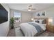 Modern bedroom with ceiling fan and window seat at 5692 Camilla St, Saint Cloud, FL 34771