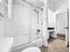 Bathroom with shower/tub combo and glass sliding door at 310 Vista Oak Dr, Longwood, FL 32779