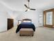 Bright bedroom with a large window and a comfortable bed at 310 Vista Oak Dr, Longwood, FL 32779