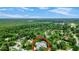 Aerial view showcasing home's location in a wooded area at 310 Vista Oak Dr, Longwood, FL 32779