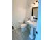 Clean powder room with pedestal sink and updated fixtures at 310 Vista Oak Dr, Longwood, FL 32779