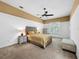Bedroom with ceiling fan and neutral-toned carpet at 310 Vista Oak Dr, Longwood, FL 32779