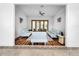 Bright sitting room with hardwood floors, light-colored furniture and access to the patio at 310 Vista Oak Dr, Longwood, FL 32779
