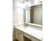 Clean bathroom with white vanity, quartz countertop and a framed mirror at 310 Vista Oak Dr, Longwood, FL 32779