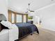 Main bedroom with ensuite bathroom and large windows at 310 Vista Oak Dr, Longwood, FL 32779