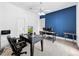 Spacious home office with ample workspace and built-in shelving at 310 Vista Oak Dr, Longwood, FL 32779