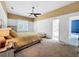 Bedroom with ensuite bathroom and ceiling fan at 310 Vista Oak Dr, Longwood, FL 32779