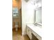 Bathroom with white vanity, quartz countertop and toilet at 310 Vista Oak Dr, Longwood, FL 32779